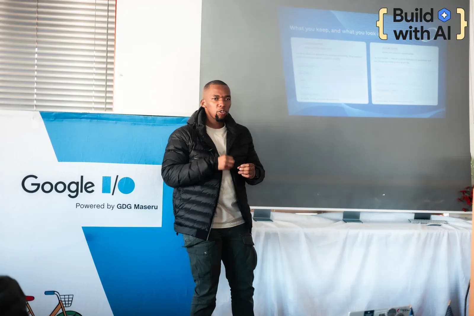 A community speaker presenting practical AI ideas during the Build with AI event